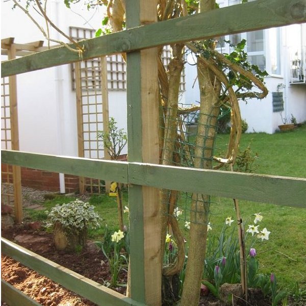 Posts are cemented in place, fence rails and gravel boards have been secured